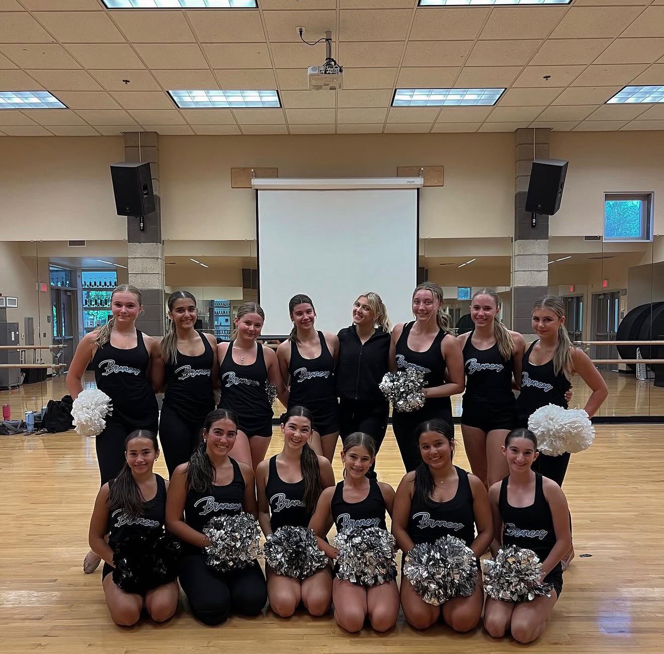 Mia Chanelle with Broncos Dance Team